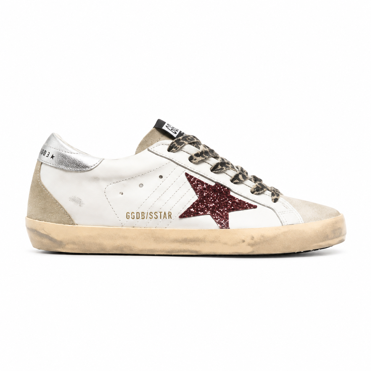 Golden Goose Super Star Sneaker with a bundy glitter star and a silver heel ribbon
